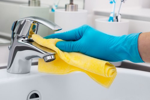 Staff responding to a workplace hazard during carpet cleaning